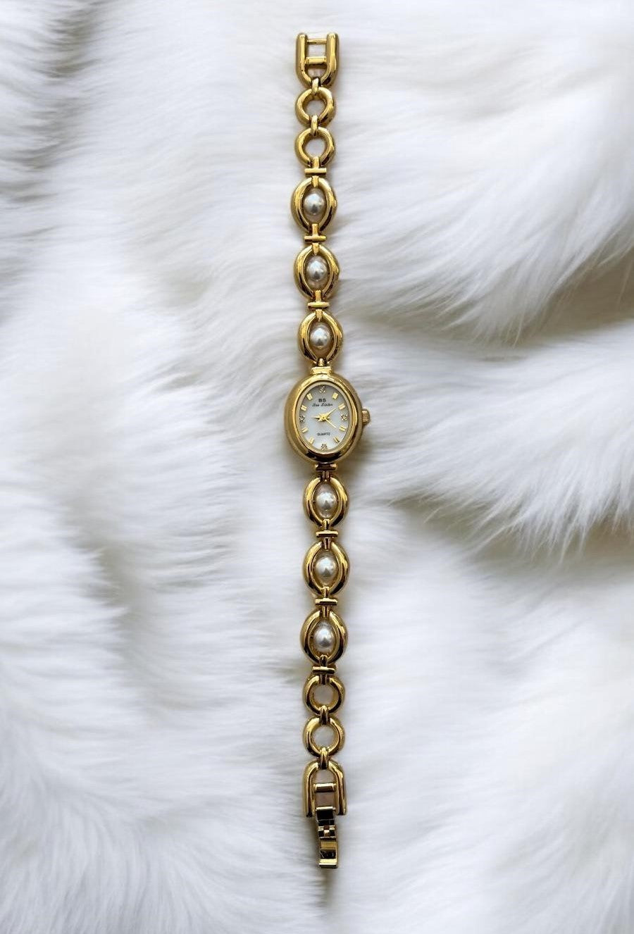 Goldene Vintage Damenuhr Edelstahl Delouria